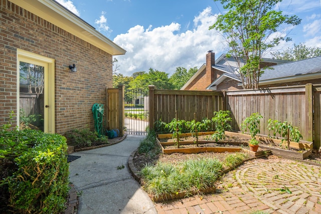 712 Wakendaw Blvd, Mount Pleasant, SC 29464 - view of yard with a vegetable garden and a gate