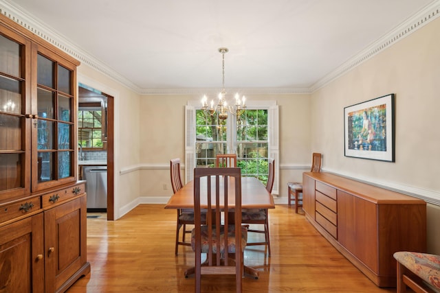 712 Wakendaw Blvd, Mount Pleasant, SC 29464 - dining space featuring a chandelier, light wood finished floors, and ornamental molding