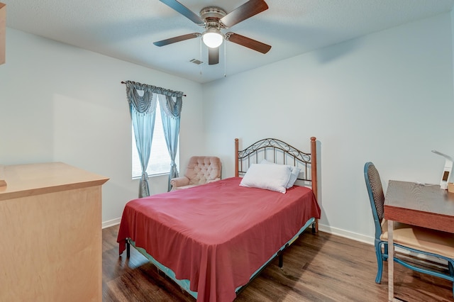 7955 Timbercreek Ln Unit 1807, North Charleston, SC 29418 - bedroom with wood finished floors, baseboards, and ceiling fan