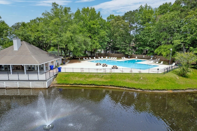 7955 Timbercreek Ln Unit 1807, North Charleston, SC 29418 - aerial view of property and surrounding area featuring a pool area, a nearby body of water, and a tree filled landscape