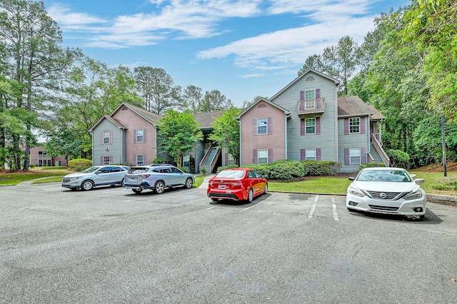 7955 Timbercreek Ln Unit 1807, North Charleston, SC 29418 - uncovered parking lot featuring stairway