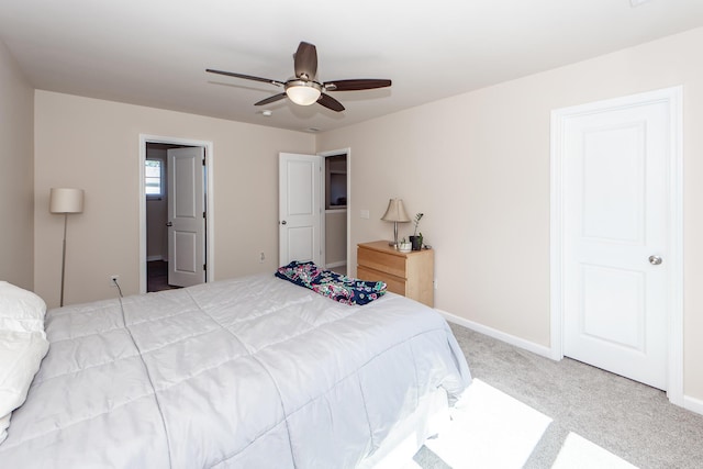 bedroom featuring ceiling fan, carpet flooring, and baseboards