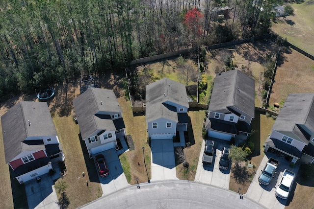 birds eye view of property with a residential view