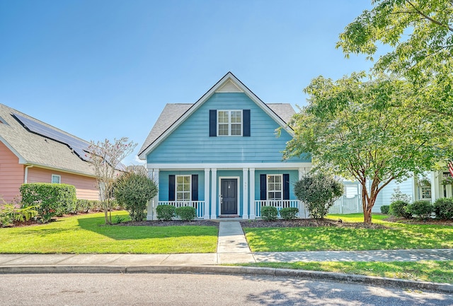 view of front of home featuring a front yard