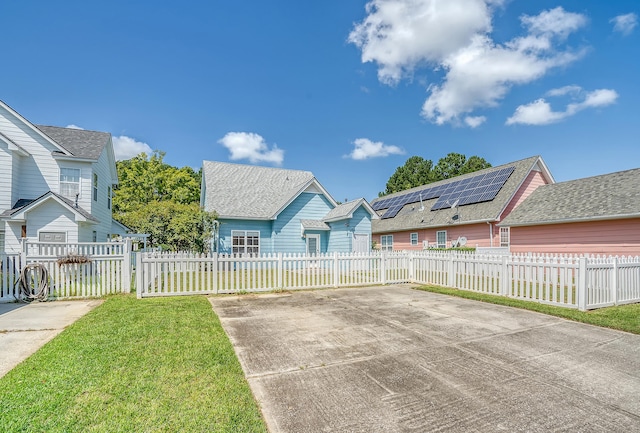 exterior space with a front lawn