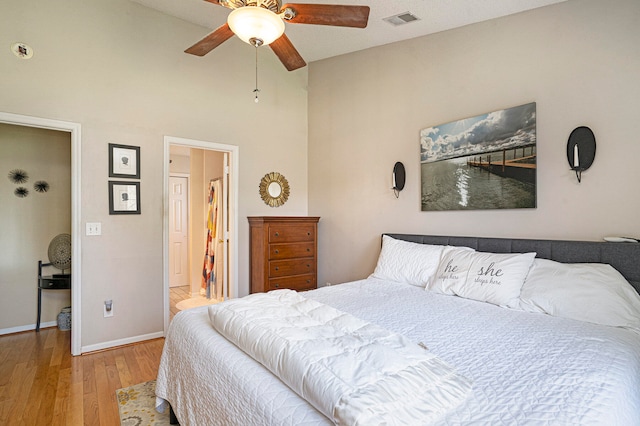 bedroom featuring light hardwood / wood-style floors and ceiling fan