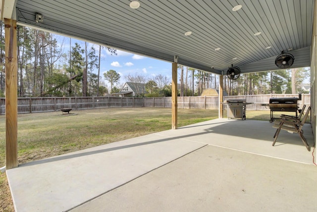 view of patio / terrace featuring a fenced backyard and a grill