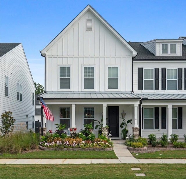 modern farmhouse with a porch