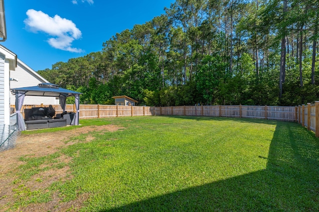 435 Foxbank Plantation Blvd, Moncks Corner, SC 29461 - view of yard with a gazebo, an outdoor living space, and a fenced backyard