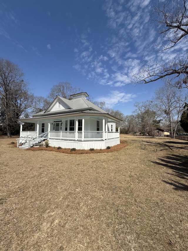 view of front of home featuring covered porch