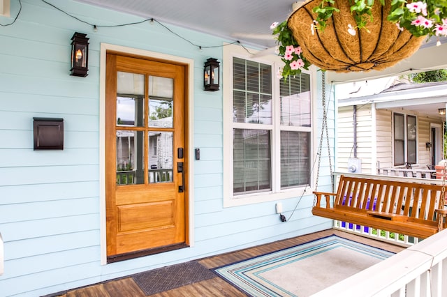 10 Riker St, Charleston, SC 29403 - doorway to property featuring covered porch
