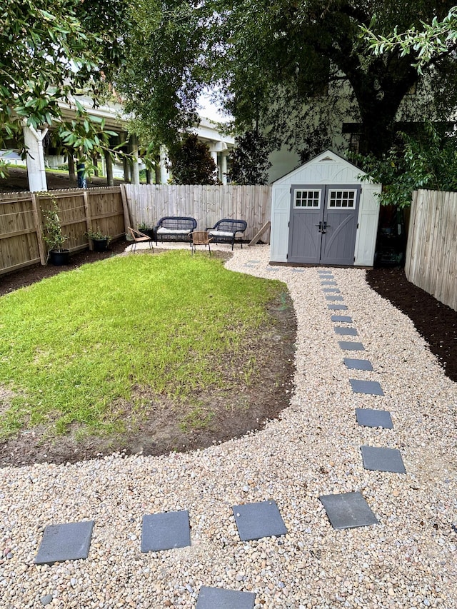 10 Riker St, Charleston, SC 29403 - fenced backyard featuring a storage shed