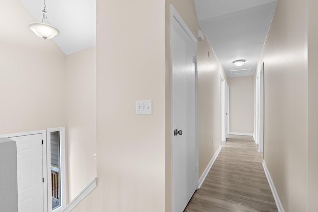 hallway featuring hardwood / wood-style flooring