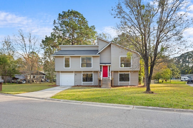 split foyer home with a garage and a front lawn