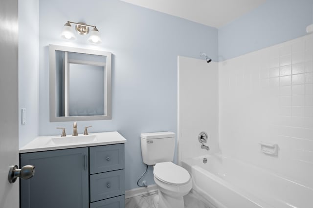 full bathroom featuring vanity, bathing tub / shower combination, and toilet