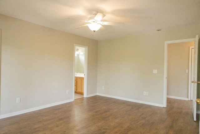 empty room with baseboards, a ceiling fan, and wood finished floors