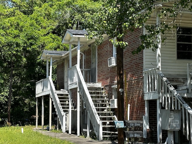 927 N Lemacks St, Walterboro, SC 29488 - view of home's exterior featuring stairway and brick siding