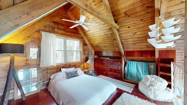 bedroom with lofted ceiling with beams, wood walls, ceiling fan, and wooden ceiling