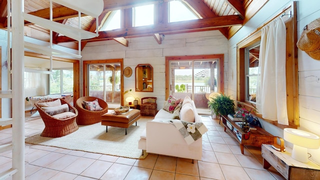 sunroom / solarium featuring vaulted ceiling with beams