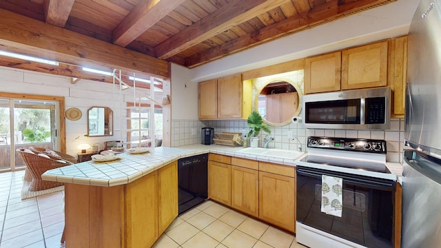 kitchen with kitchen peninsula, stainless steel appliances, sink, wooden ceiling, and beamed ceiling