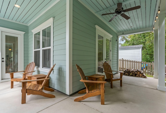 view of patio with a porch and ceiling fan