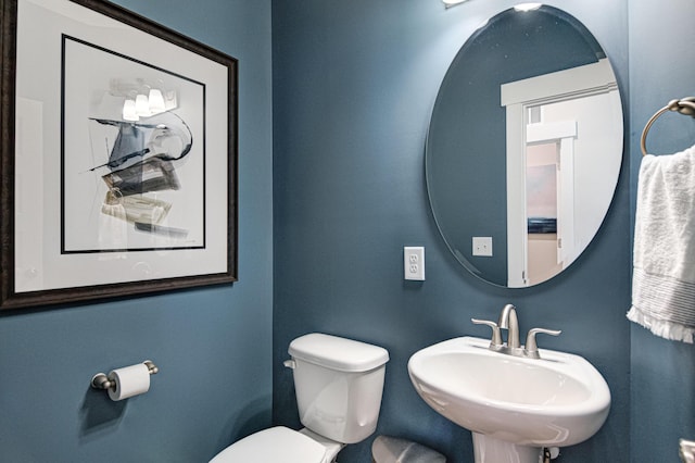 bathroom featuring sink and toilet