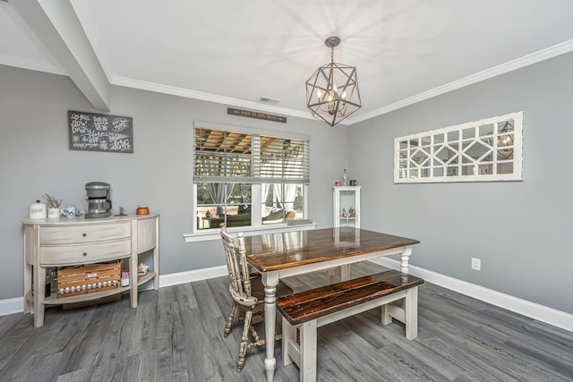 dining space with a chandelier, crown molding, baseboards, and dark wood-style flooring