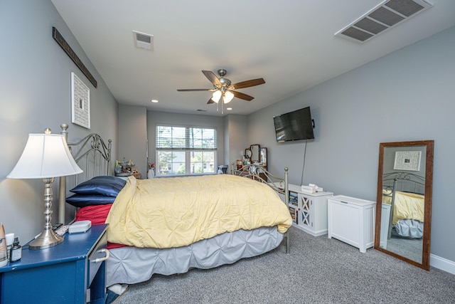 carpeted bedroom featuring visible vents, recessed lighting, baseboards, and a ceiling fan