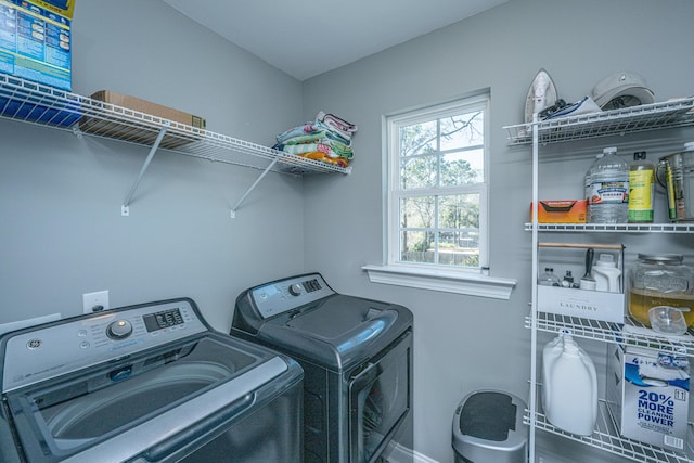 laundry area featuring washing machine and dryer and laundry area