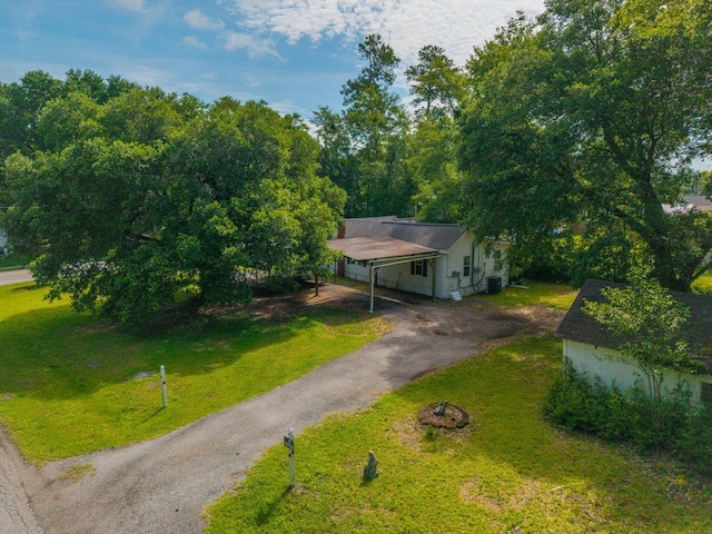 145 Ravenell Dr, Saint Stephen, SC 29479 - view of front of home with driveway, a front lawn, and a carport