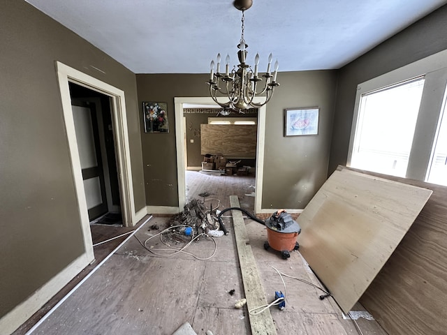 dining area featuring an inviting chandelier