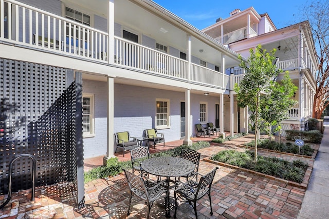 view of patio / terrace with a balcony