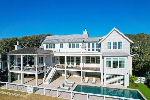 rear view of property with a patio