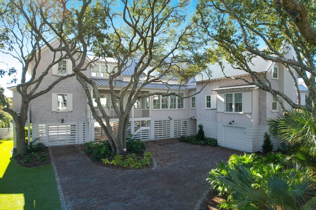 view of front of home with a garage