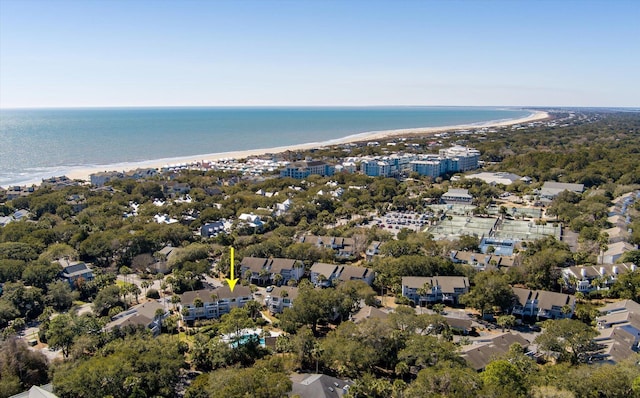 aerial view with a water view and a beach view