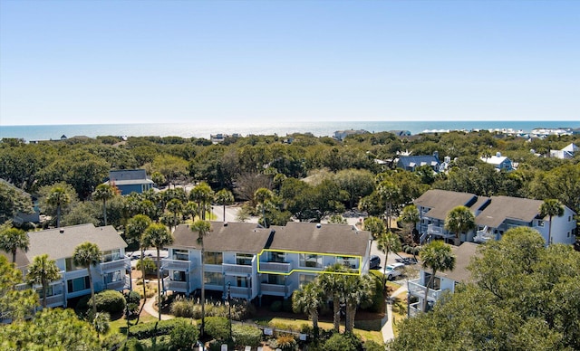 birds eye view of property with a water view and a residential view