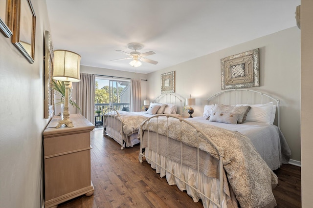 bedroom featuring baseboards, a ceiling fan, and dark wood-style flooring