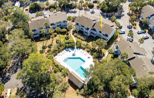 birds eye view of property with a residential view