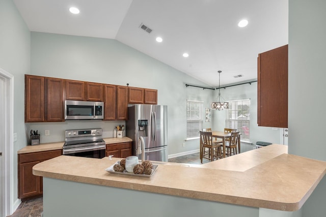 201 Maywood Dr, Moncks Corner, SC 29461 - kitchen with appliances with stainless steel finishes, light countertops, pendant lighting, recessed lighting, and high vaulted ceiling