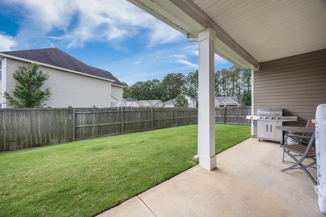 201 Maywood Dr, Moncks Corner, SC 29461 - fenced backyard with a patio area