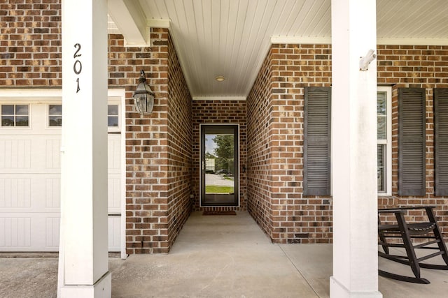 201 Maywood Dr, Moncks Corner, SC 29461 - doorway to property with brick siding and covered porch