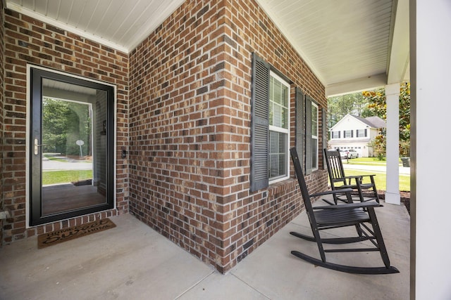 201 Maywood Dr, Moncks Corner, SC 29461 - view of exterior entry featuring covered porch and brick siding