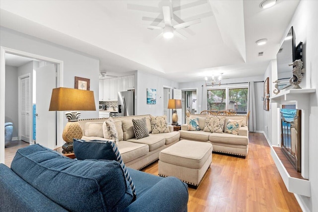 1025 Scaup Ct, Kiawah Island, SC 29455 - living area with a ceiling fan, a chandelier, and light wood finished floors