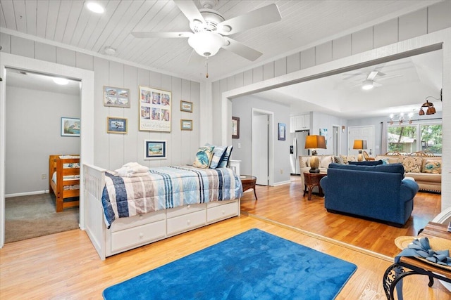 1025 Scaup Ct, Kiawah Island, SC 29455 - bedroom featuring stainless steel fridge, light wood-style flooring, ceiling fan, and crown molding