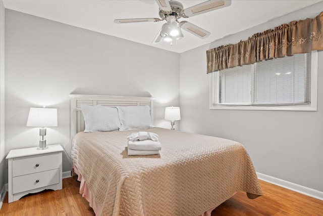 1025 Scaup Ct, Kiawah Island, SC 29455 - bedroom with wood finished floors and a ceiling fan