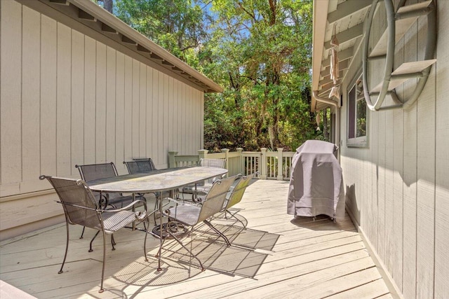 1025 Scaup Ct, Kiawah Island, SC 29455 - wooden deck with outdoor dining space and area for grilling