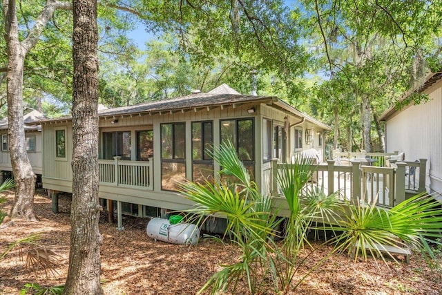 1025 Scaup Ct, Kiawah Island, SC 29455 - back of house with a sunroom