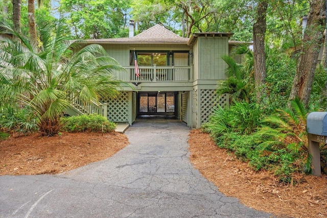 1025 Scaup Ct, Kiawah Island, SC 29455 - coastal home with a carport and driveway