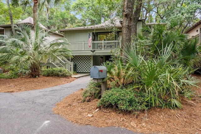 1025 Scaup Ct, Kiawah Island, SC 29455 - view of front of home with asphalt driveway and stairs