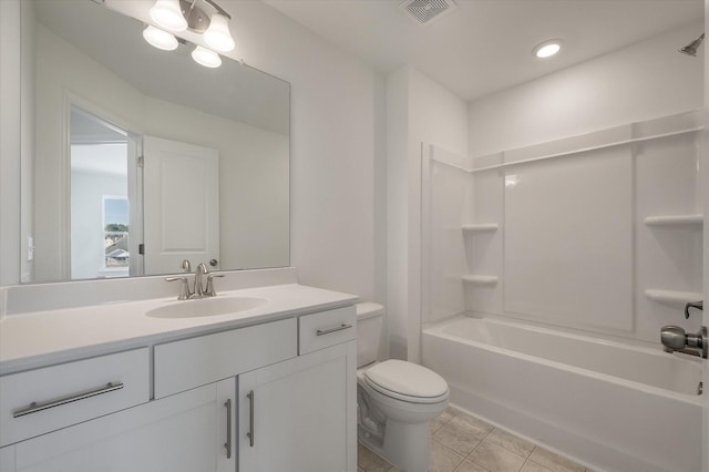 full bath with visible vents, toilet, vanity, shower / tub combination, and tile patterned floors